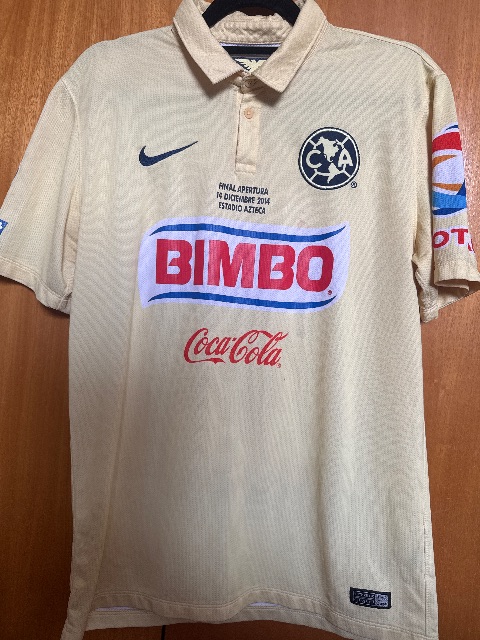 Primera equipación de Sambu del América 2014/15, vista frontal
