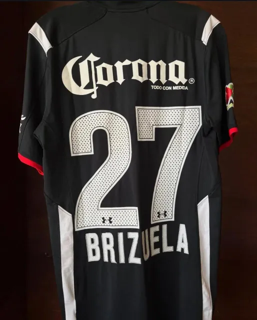 Tercera equipación de Isaac Brizuela del Deportivo Toluca FC 2014/15, vista trasera
